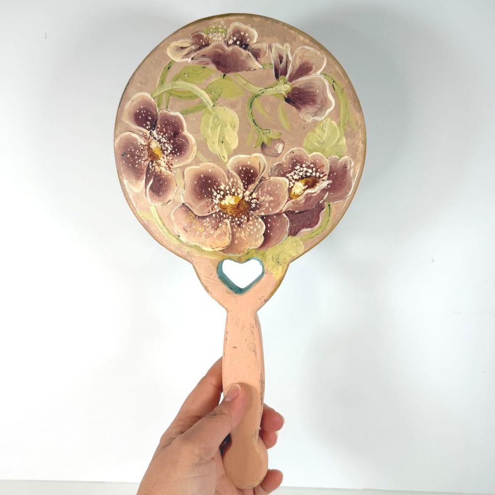 Hand held cottage core mirror with hand painted florals‎ heart cutout. Wooden